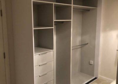 Light grey built in wardrobe in bedroom | The Sliding Wardrobe Company | Kent | Essex | East Sussex